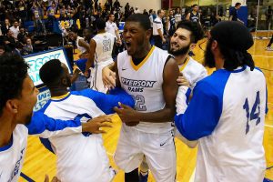 TORONTO, ON - Nov 4, 2015 : Ontario University Athletics Mens Basketball Home Opener game action between the Ryerson Rams and the University of Toronto Varsity Blues. (Courtesy Alex D'Addese/Ryerson Rams Athletics)