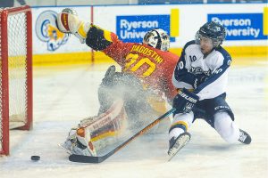 TORONTO, ON - Feb 26, 2016 : Ontario University Athletics Mens Hockey OUA West Semi-Final Game 2 action between Ryerson Rams and Guelph Gryphons. (Courtesy Alex D'Addese/Ryerson Rams Athletics)