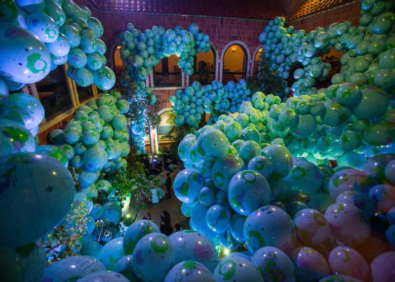 7,000 beach balls are printed to resemble globes in the Walk Among Worlds installation at Nuit Blanche 2014. (Courtesy ScotiabankNuitBlanche.ca)