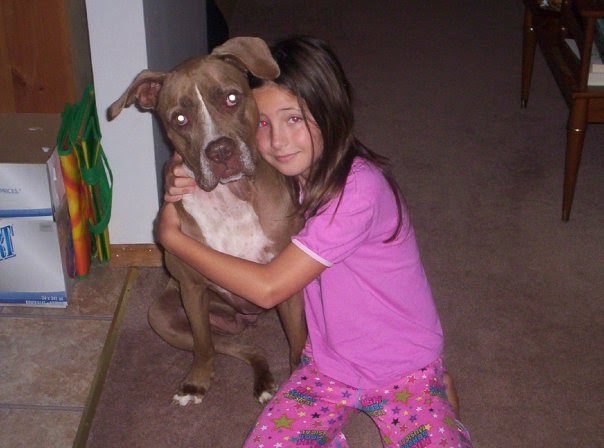 10-year-old Kayla and her pit bull, Nika. (Kayla Empey/Ryersonian)